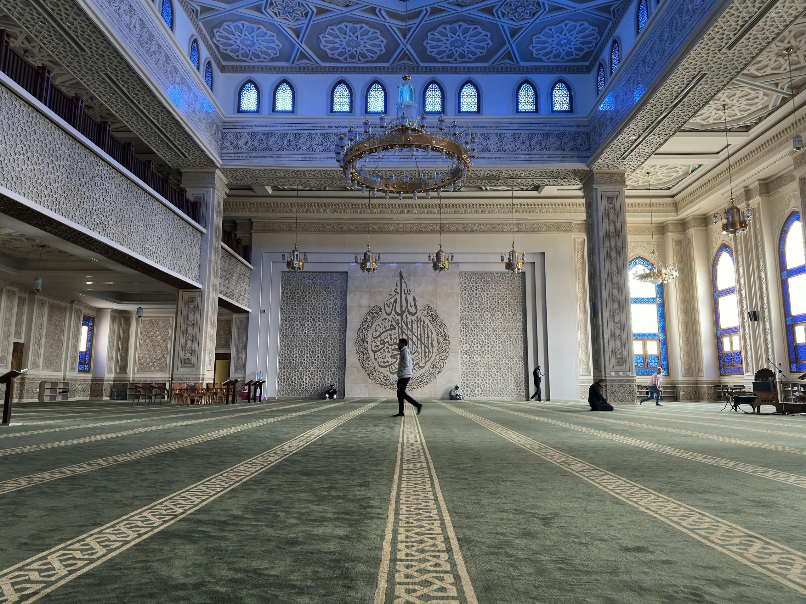 Elegant mosque interior in Al Shorouk City, Egypt showcasing intricate Islamic architecture and natural light.